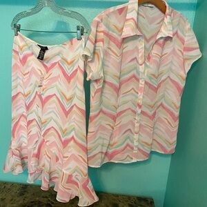 Women’s New York and Company lace top with intricate blue and white design.